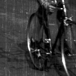 Cyclist riding in heavy rain.