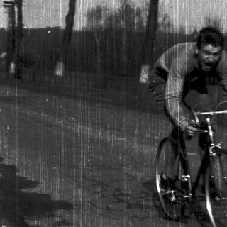 Cyclist riding in heavy rain.