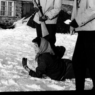 People playing snow games with ski poles.