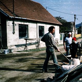 Group of men constructing a concrete foundation.