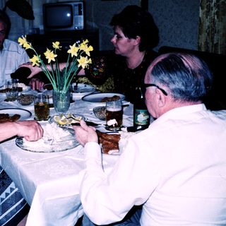 Family gathered for a meal together indoors.