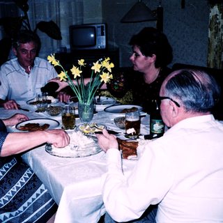 Family gathered for a meal together indoors.
