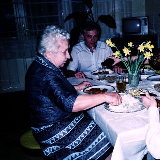 Family gathered for a meal together indoors.