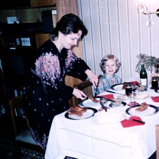 Family dining together indoors during a meal.