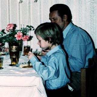 Family dining together indoors during a meal.
