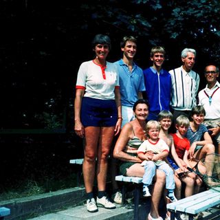 Family group photo at outdoor event or gathering.