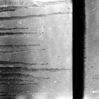 Rain streaks on a wet window.