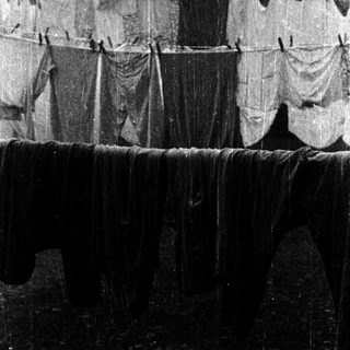 Clothes drying on outdoor washing line.