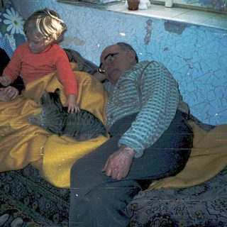 Family sharing a simple indoor moment together.