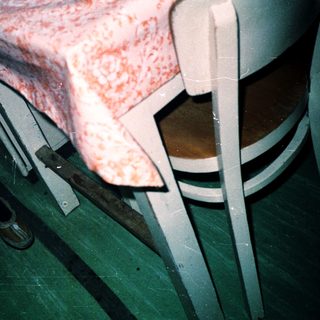 Medical bed with raised, reddened skin area.
