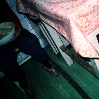 Medical bed with raised, reddened skin area.