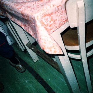 Medical bed with raised, reddened skin area.