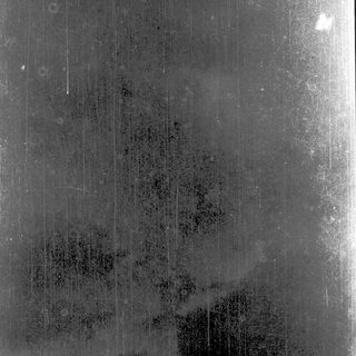 Raindrops on a wet window.