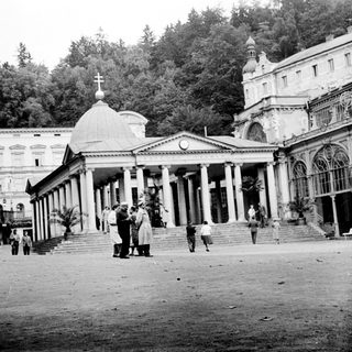 Historic building complex with classical architecture and courtyard.