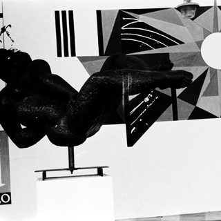 Abstract sculpture with geometric background.