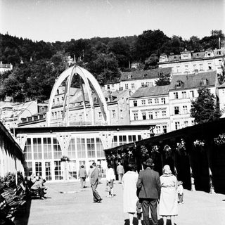 Historic spa resort with grand architectural building.
