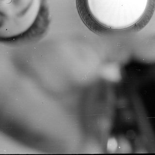 blurred torso with circular light