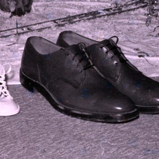 Shoes by holiday tree decoration