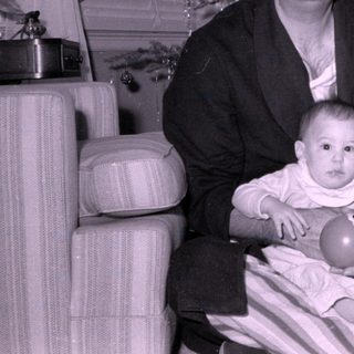 Mid-century Christmas portrait with man and baby