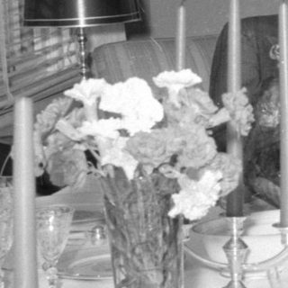 formal dining table with seated man