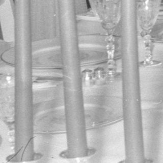 formal dining table with seated man