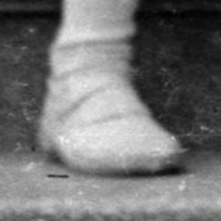 Six children posed on concrete stairs.