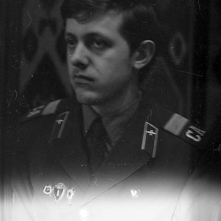 Man in military uniform with 'CA' shoulder boards.